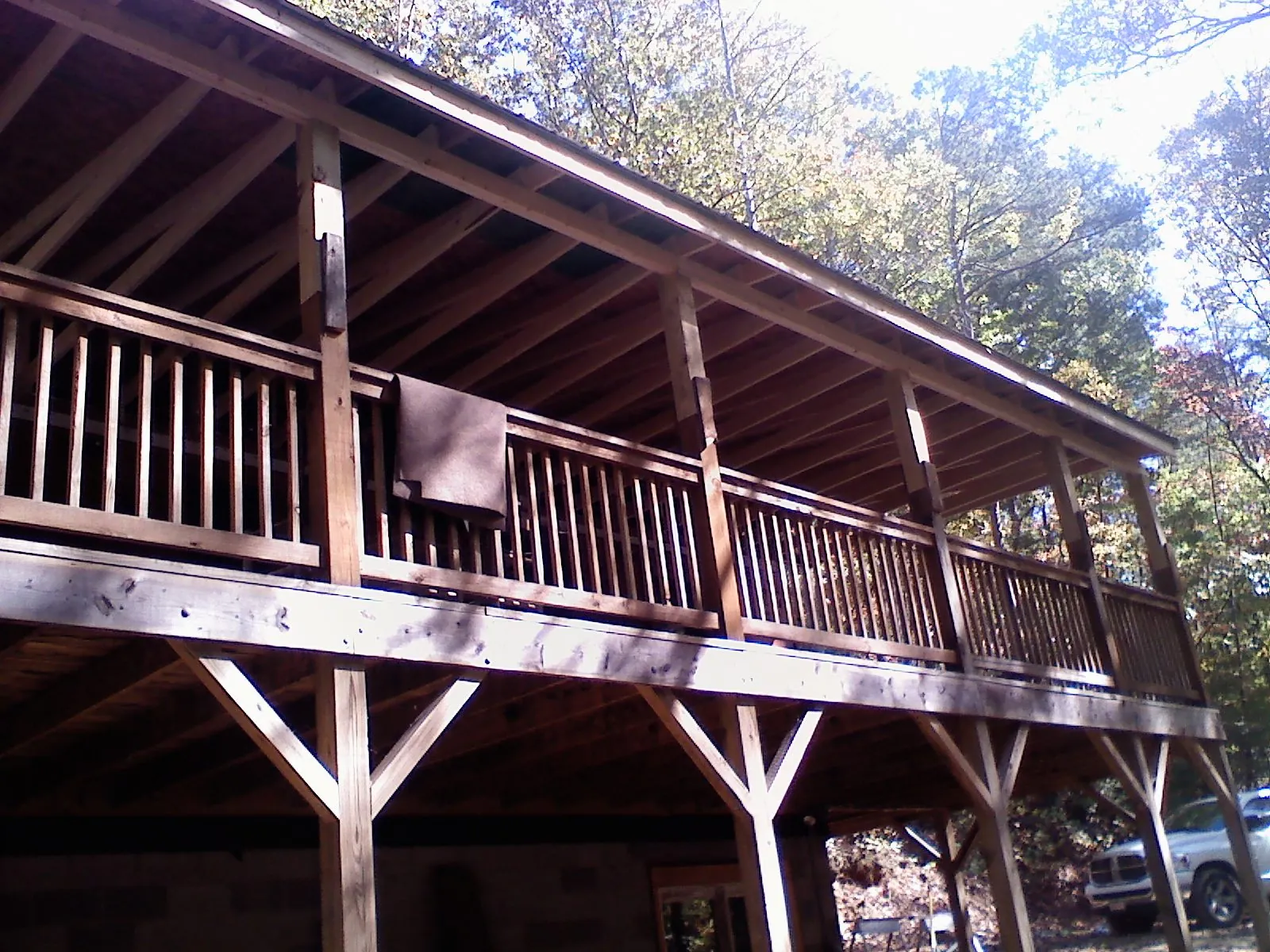 Timber framing under a new elevated porch and deck — Roof Leak Repair in Casnovia by Roofing Brothers
